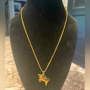 Elegant Gold Necklace with Bull Pendant